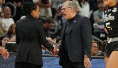 UConn coach Geno Auriemma (right) yells at South Carolina coach Dawn Staley at the end of Friday night's semifinal in Phoenix, won by South Carolina.