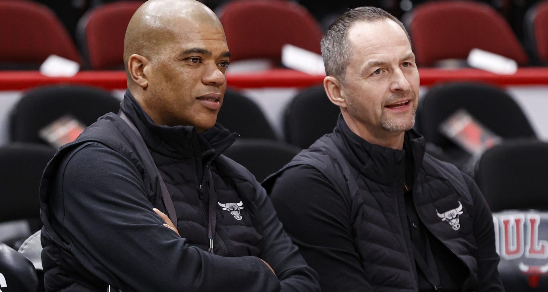 Apr 22, 2022; Chicago, Illinois, USA; Chicago Bulls executive vice president of basketball operations Arturas Karnisovas (right) talks with general manager Marc Eversley (left) before game three of the first round for the 2022 NBA playoffs against the Milwaukee Bucks at United Center. Mandatory Credit: Kamil Krzaczynski-USA TODAY Sports
