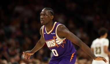 Mar 24, 2026; Phoenix, Arizona, USA; Phoenix Suns forward Rasheer Fleming (20) against the Denver Nuggets at Mortgage Matchup Center. Mandatory Credit: Mark J. Rebilas-Imagn Images
