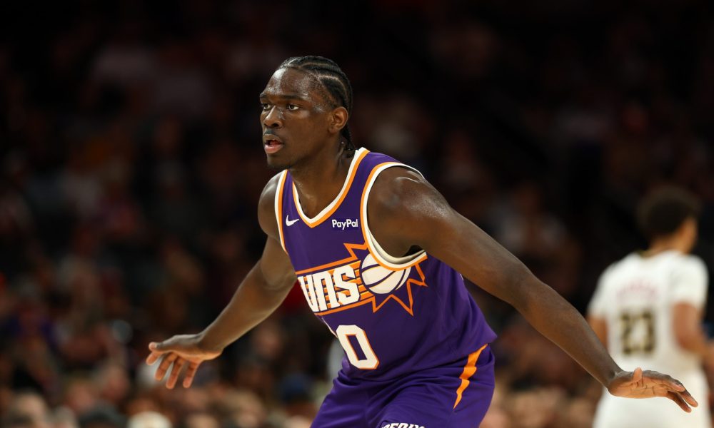 Mar 24, 2026; Phoenix, Arizona, USA; Phoenix Suns forward Rasheer Fleming (20) against the Denver Nuggets at Mortgage Matchup Center. Mandatory Credit: Mark J. Rebilas-Imagn Images