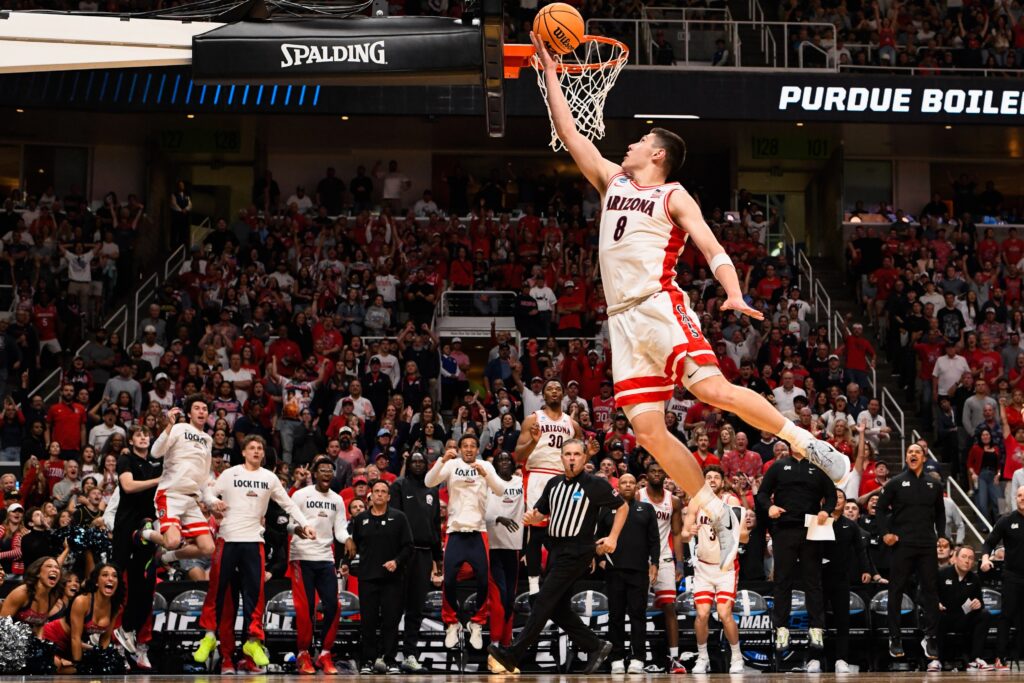 Arizona Wildcats forward Ivan Kharchenkov (8) goes up for two against the Purdue Boilermakers in the second half during an Elite Eight game of the West Regional of the men's 2026 NCAA Tournament at SAP Center