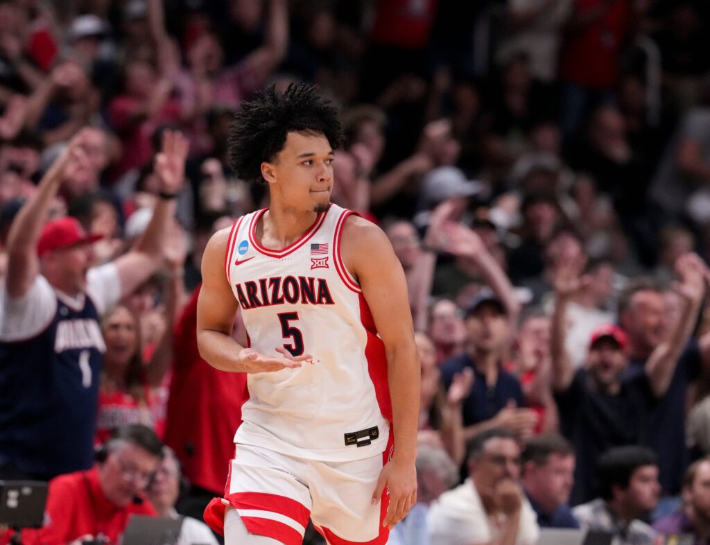 Arizona Wildcats guard Brayden Burries (5) reacts after scoring a three-point field goal against the Purdue Boilermakers during an NCAA Tournament game Saturday, March 28, 2026 at SAP Center in San Jose, Calif. Purdue fell to Arizona 79-64.