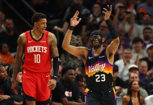 Apr 7, 2026; Phoenix, Arizona, USA; Phoenix Suns guard Jordan Goodwin (23) celebrates a three point shot alongside Houston Rockets forward Jabari Smith Jr. (10) in the first half at Mortgage Matchup Center. Mandatory Credit: Mark J. Rebilas-Imagn Images