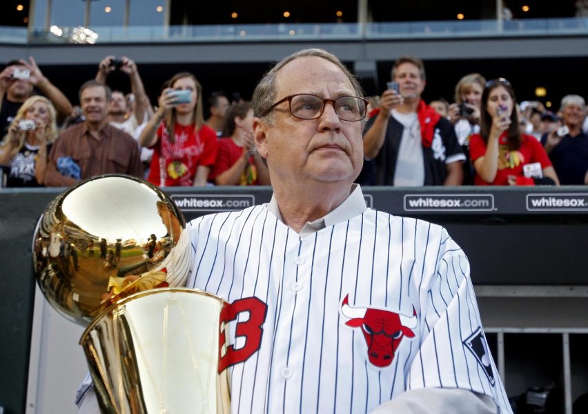 Chicago Bulls chairman Jerry Reinsdorf holds the NBA championship trophy before the game between the Chicago White Sox and New York Yankees at US Cellular Field.