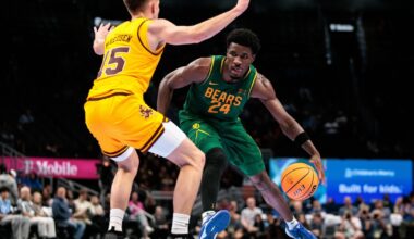Mar 10, 2026; Kansas City, MO, USA; Baylor Bears guard Tounde Yessoufou (24) drives against Arizona State Sun Devils guard Noah Meeusen (15) during the second half at T-Mobile Center. Mandatory Credit: William Purnell-Imagn Images