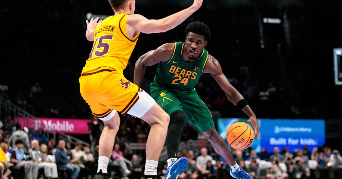 Mar 10, 2026; Kansas City, MO, USA; Baylor Bears guard Tounde Yessoufou (24) drives against Arizona State Sun Devils guard Noah Meeusen (15) during the second half at T-Mobile Center. Mandatory Credit: William Purnell-Imagn Images