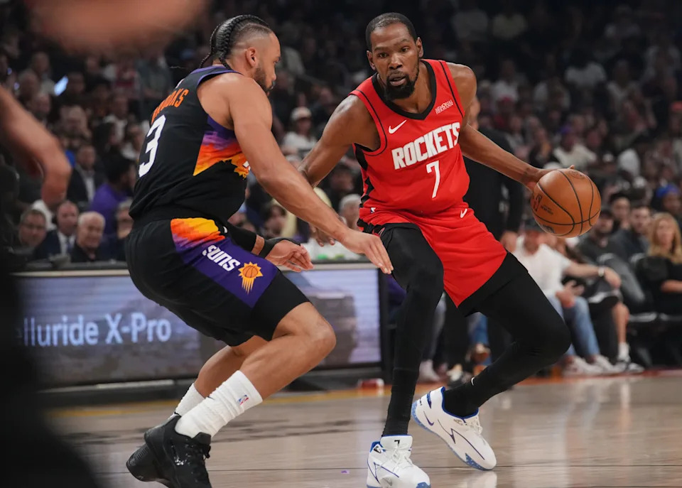 Phoenix Suns forward Dillon Brooks (3) defends Houston Rockets forward Kevin Durant (7) at the Mortgage Matchup Center in Phoenix, on April 7, 2026.