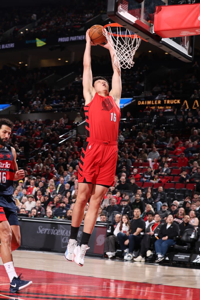 Yang Hansen #16 of the Portland Trail Blazers dunks the ball during the game against the Washington Wizards on March 29, 2026 at the Moda Center Arena in Portland. NBAE via Getty Images