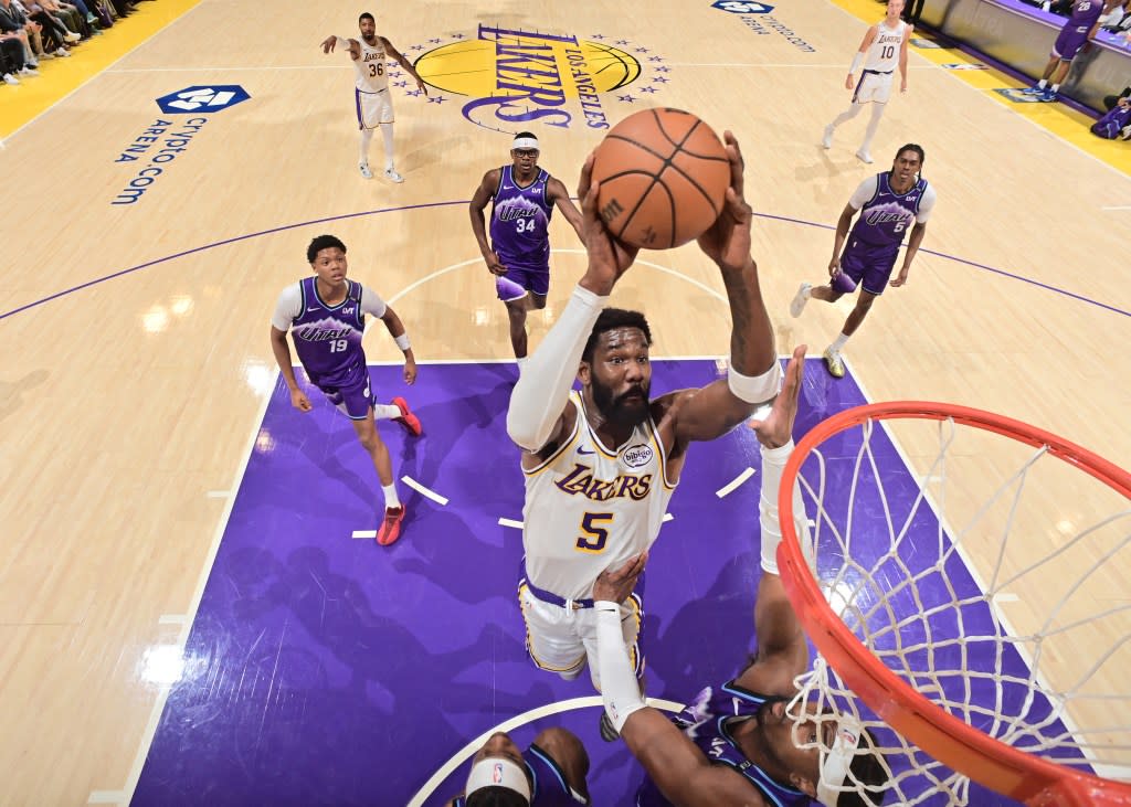 Deandre Ayton goes up for a slam in the paint. NBAE via Getty Images