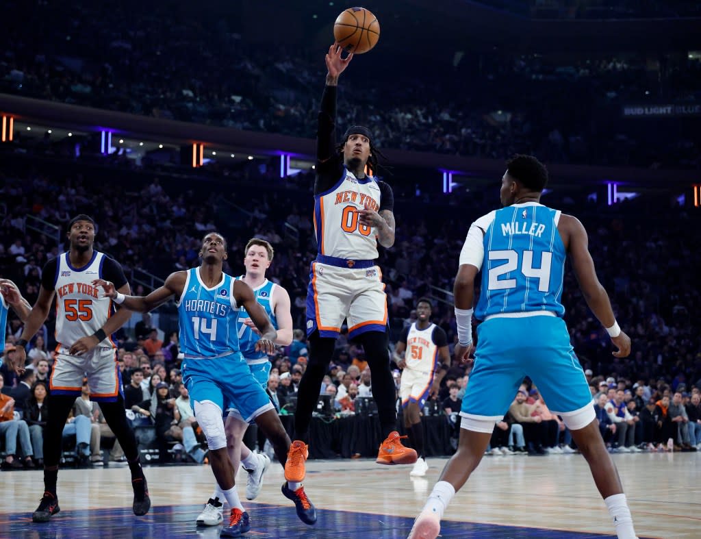 Knicks guard Jordan Clarkson passes the ball over Charlotte Hornets forward Brandon Miller. JASON SZENES FOR THE NEW YORK POST