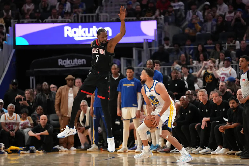 Houston Rockets forward Kevin Durant defends Golden State Warriors guard Stephen CurryCary Edmondson-Imagn Images