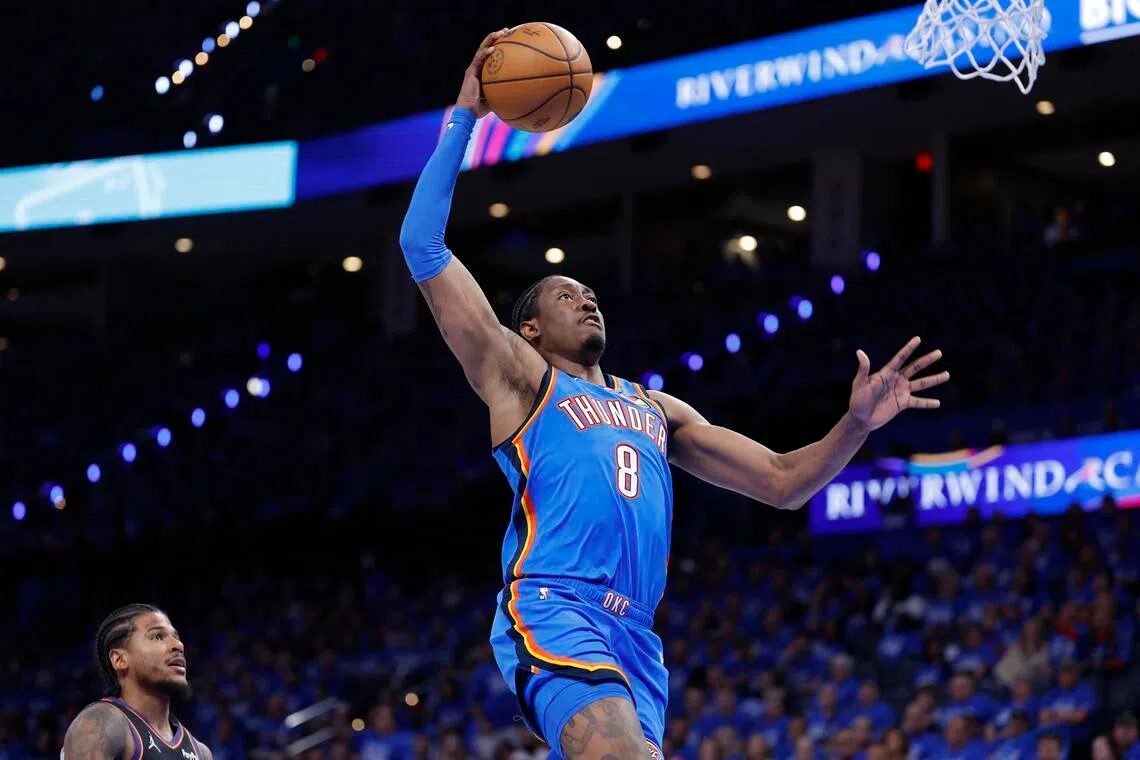 Oklahoma City Thunder guard Jalen Williams goes up for a dunk against the Phoenix Suns in the second half during Game 1 of the first round of the 2026 NBA Play-offs at Paycom Center.
