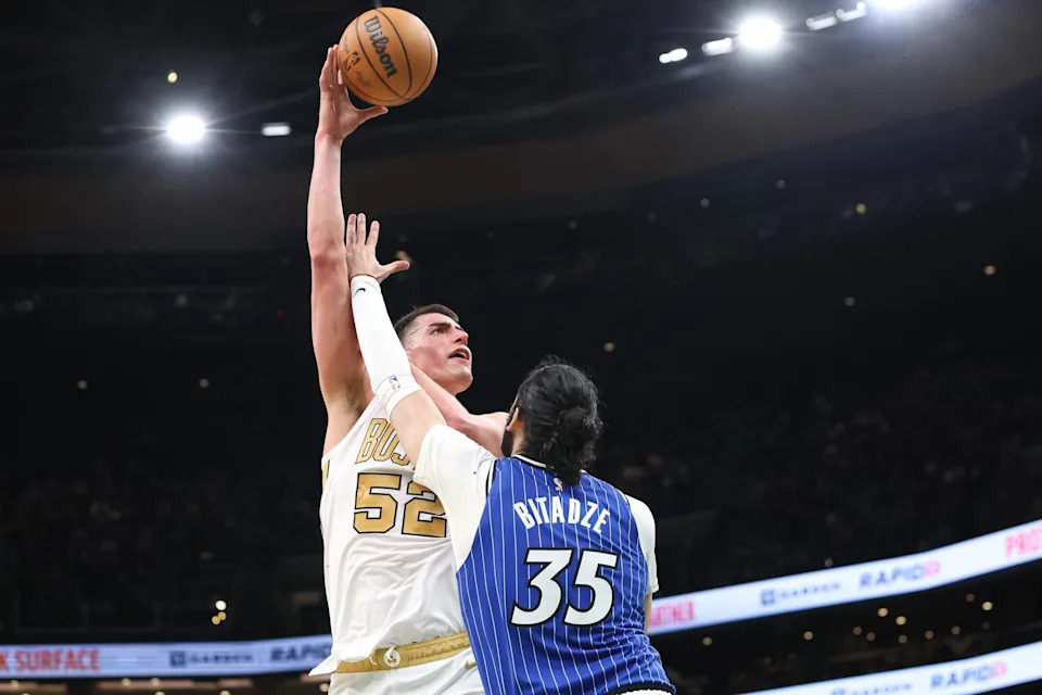 Apr 12, 2026; Boston, Massachusetts, USA; Boston Celtics forward Luka Garza (52) shoots during the second half against the Orlando Magic at TD Garden. Mandatory Credit: Paul Rutherford-Imagn Images