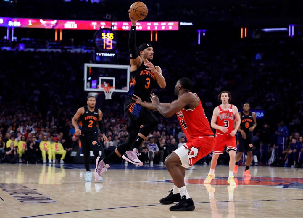 Guard Josh Hart of the New York Knicks makes a jumping pass over forward Patrick Williams #44 of the Chicago Bulls during the first half at Madison Square Garden on April 3, 2026, in New York, NY. Jason Szenes for the New York Post