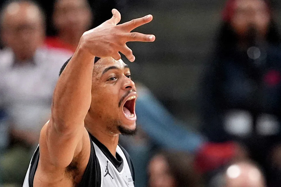 San Antonio Spurs forward Keldon Johnson celebrates after scoring during the second half of an NBA basketball game against the Los Angeles Clippers, Thursday, April 2, 2026, in Inglewood, Calif. (AP Photo/Mark J. Terrill) (Mark J. Terrill/Associated Press)