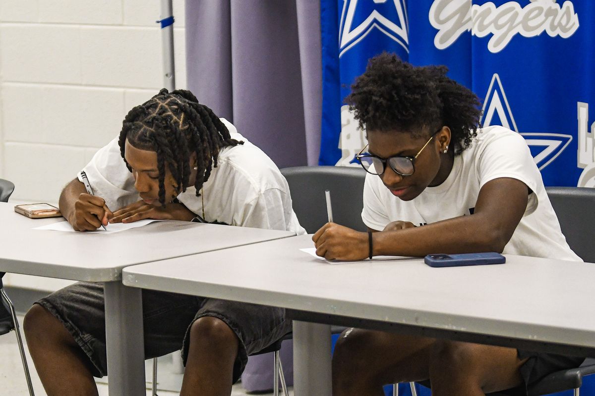 Atkinson and Swint sign to play college basketball
