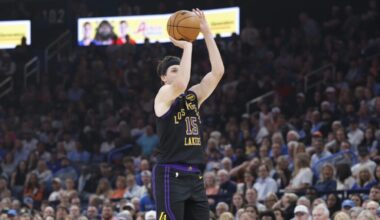 Oklahoma City, Oklahoma, USA; Los Angeles Lakers guard Austin Reaves (15) shoots a three point basket against the Oklahoma City Thunder during the first quarter at Paycom Center. Mandatory Credit: Alonzo Adams-Imagn Images