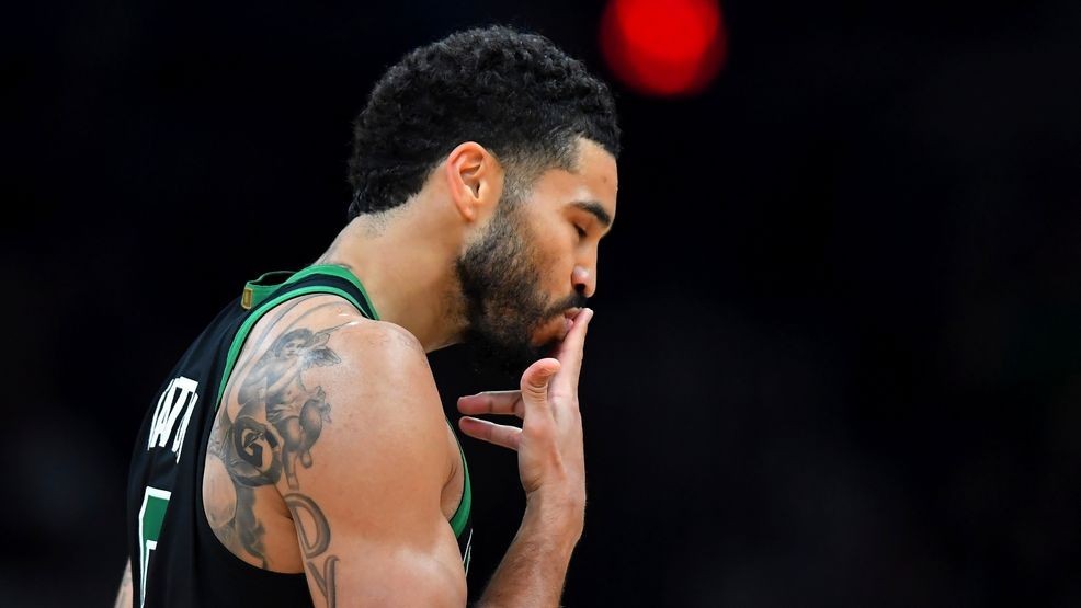 Boston Celtics forward Jayson Tatum celebrates after scoring in the first half of an NBA basketball game against the Toronto Raptors, Sunday, April 5, 2026, in Boston. (AP Photo/Steven Senne)