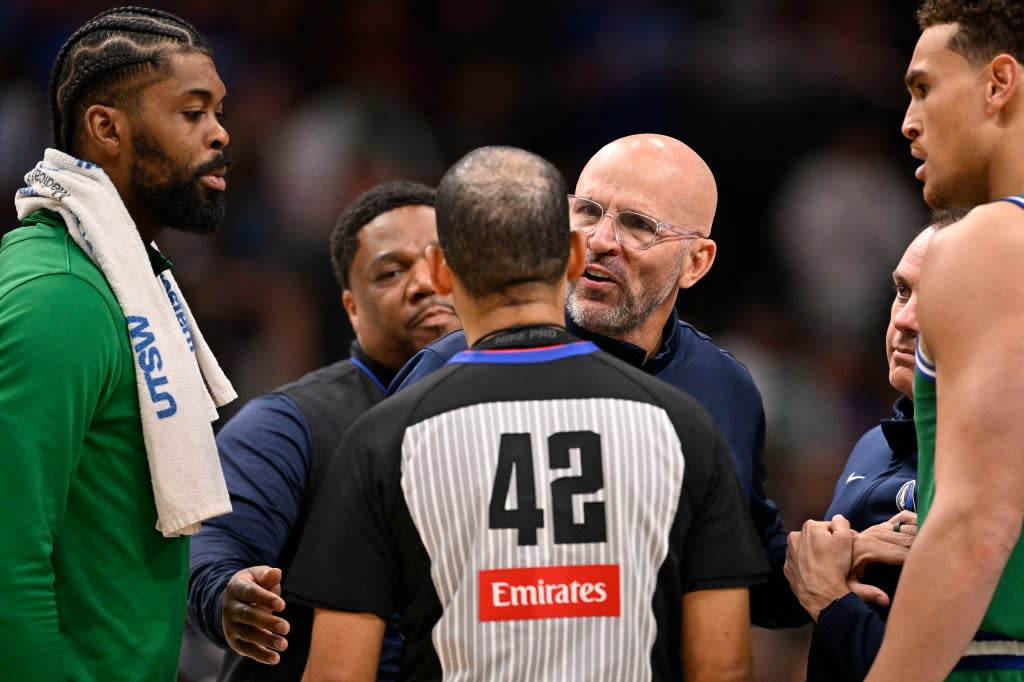 Dallas Mavericks forward Naji Marshall and head coach Jason Kidd speaking to NBA referee Eric Lewis. IMAGN IMAGES via Reuters Connect