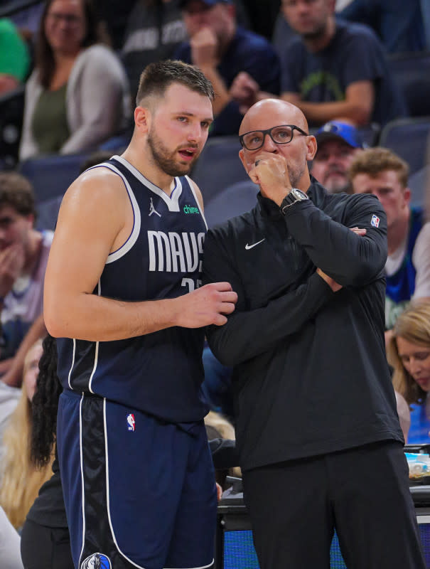 Former Dallas Mavericks guard Luka Doncic (left) and head coach Jason KiddBrad Rempel-Imagn Images