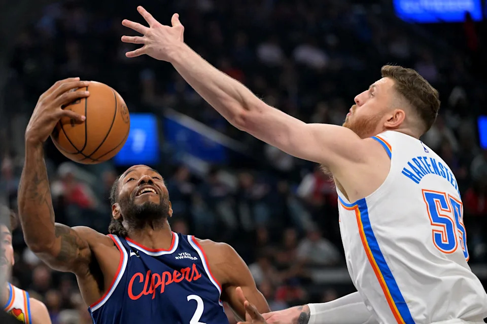 Apr 8, 2026; Inglewood, California, USA; Oklahoma City Thunder center Isaiah Hartenstein (55) reaches to defend a shot by Los Angeles Clippers forward Kawhi Leonard (2) in the first half at Intuit Dome. Mandatory Credit: Jayne Kamin-Oncea-Imagn Images