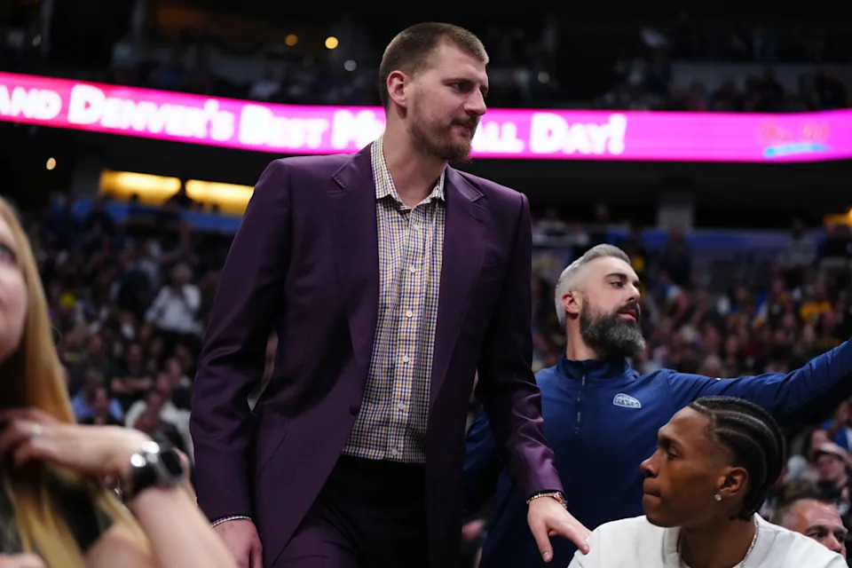 Apr 10, 2026; Denver, Colorado, USA; Denver Nuggets center Nikola Jokic (15) arrives during the first quarter against the Oklahoma City Thunder at Ball Arena. Mandatory Credit: Ron Chenoy-Imagn Images