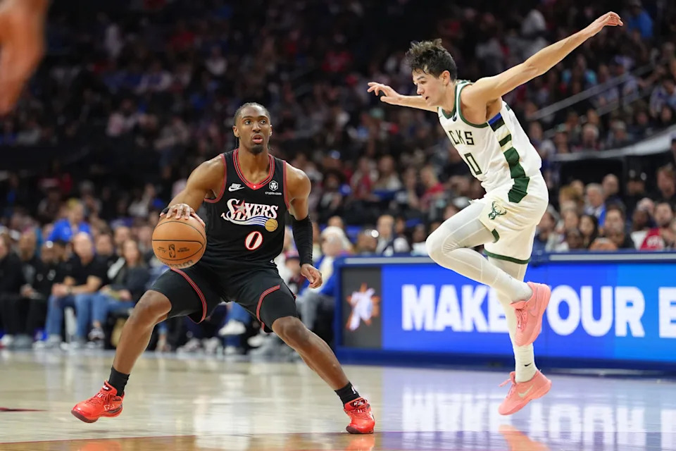Apr 12, 2026; Philadelphia, Pennsylvania, USA; Philadelphia 76ers guard Tyrese Maxey (0) controls the ball against Milwaukee Bucks guard Cormac Ryan (30) in the third quarter at Xfinity Mobile Arena. Mandatory Credit: Kyle Ross-Imagn Images