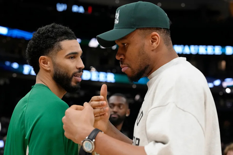 MILWAUKEE, WISCONSIN - APRIL 03: Jayson Tatum #0 of the Boston Celtics and Giannis Antetokounmpo #34 of the Milwaukee Bucks talk after the game at Fiserv Forum on April 03, 2026 in Milwaukee, Wisconsin. NOTE TO USER: User expressly acknowledges and agrees that, by downloading and or using this photograph, User is consenting to the terms and conditions of the Getty Images License Agreement. (Photo by Patrick McDermott/Getty Images)