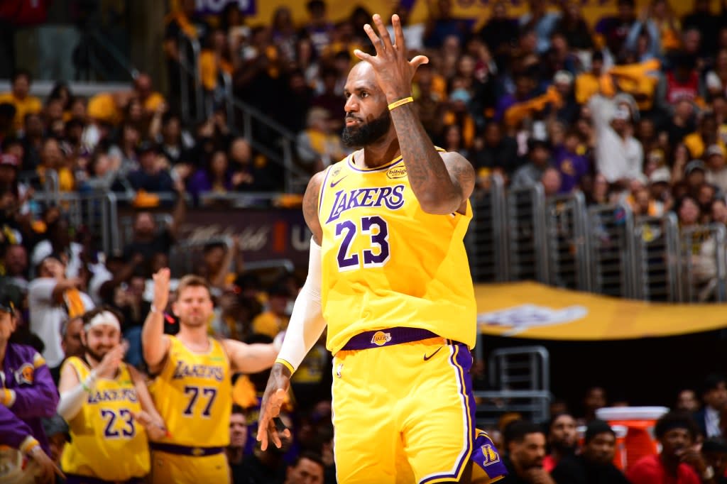 The Lakers’ LeBron James celebrates against the Rockets on Saturday night. NBAE via Getty Images