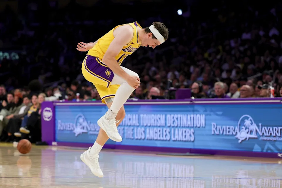 Los Angeles Lakers guard Austin Reaves reacts during the second half of an NBA basketball game against the Washington Wizards Monday, March 30, 2026, in Los Angeles. (AP Photo/Ryan Sun)
