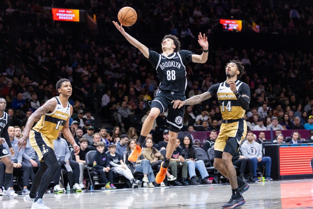 Nets guard Nolan Traore (88) shoots past Washington Wizards Leaky Black during the first half at Barclays Center, Sunday, April 5, 2026, in Brooklyn, NY. Corey Sipkin for the NY POST