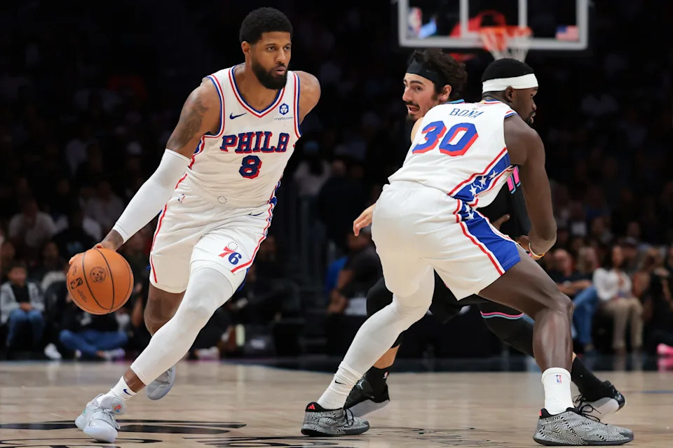 Mar 30, 2026; Miami, Florida, USA; Philadelphia 76ers forward Paul George (8) drives to the basket against Miami Heat forward Jaime Jaquez Jr. (11) during the third quarter at Kaseya Center. Mandatory Credit: Sam Navarro-Imagn Images