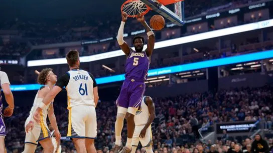 Los Angeles Lakers center Deandre Ayton (5) dunks the ball against the Golden State Warriors in the first quarter at the Chase Center. 