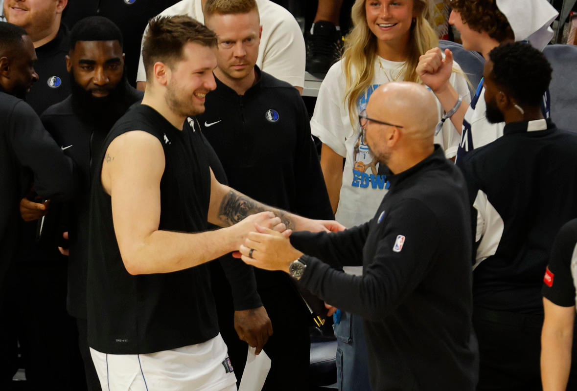 Dallas Mavericks guard Luka Doncic (77) celebrates with head coach Jason Kidd after winning the Western Conference Championship against the Minnesota Timberwolves in game five of the Western Conference Finals for the 2024 NBA playoffs at Target Center.Bruce Kluckhohn-USA TODAY Sports