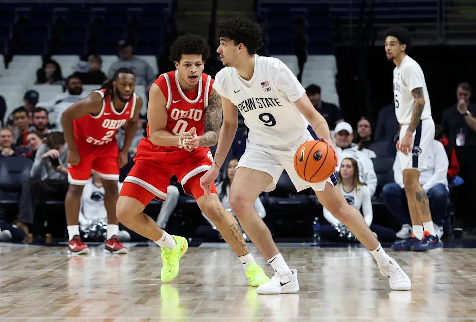 Mar 4, 2026; University Park, Pennsylvania, USA; Ohio State Buckeyes guard John Mobley Jr (0) defends as Penn State Nittany Lions guard Melih Tunca (9) dribbles the ball during the second half at Bryce Jordan Center. Mandatory Credit: Matthew O'Haren-Imagn Images