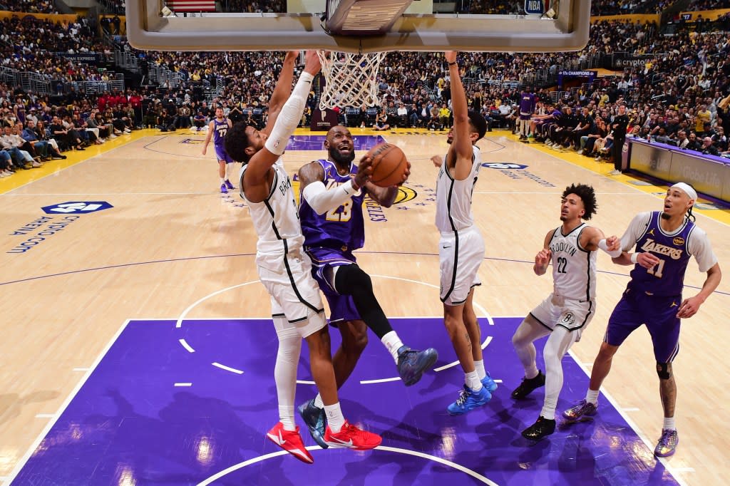 LeBron James of the Los Angeles Lakers drives to the basket during the game against the Brooklyn Nets on March 27, 2026 at Crypto.Com Arena in Los Angeles, California. NBAE via Getty Images