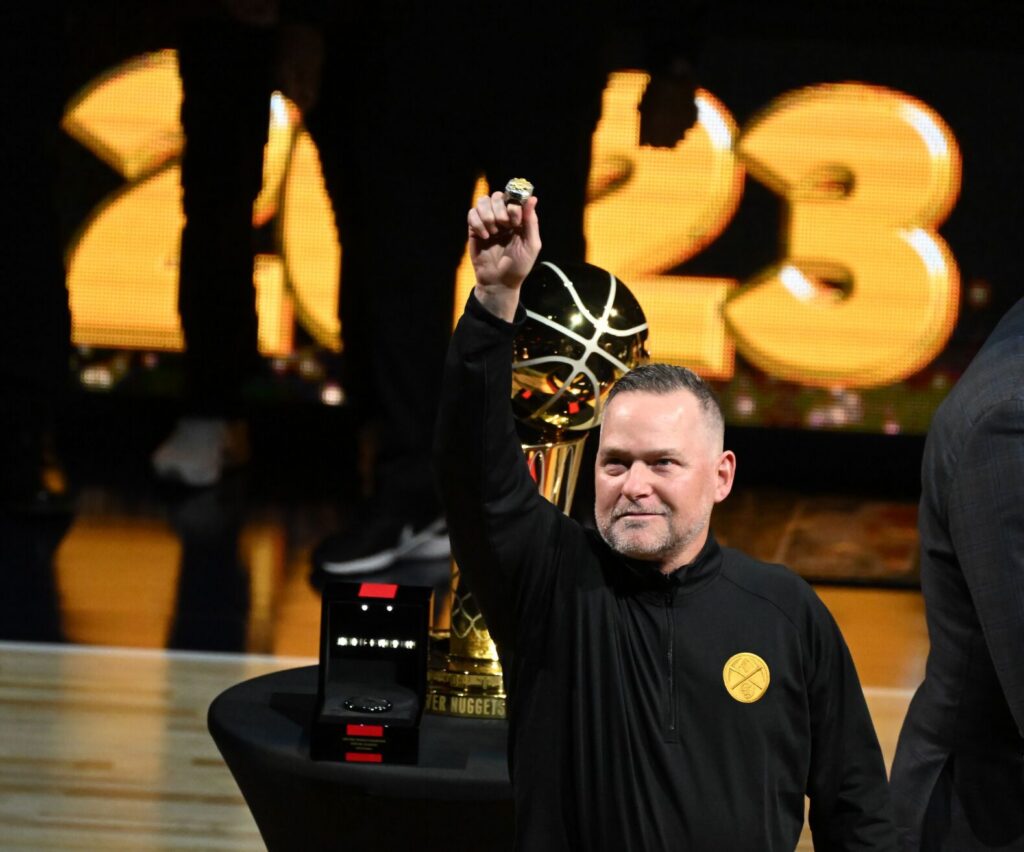 North Carolina hires ex-Nuggets coach Michael Malone