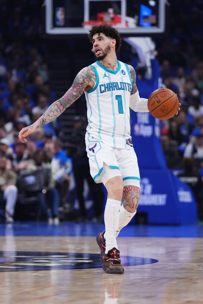 LaMelo Ball of the Charlotte Hornets dribbles the ball up the court against the Orlando Magic during the third quarter of a Play-In Tournament game at Kia Center on April 17, 2026 in Orlando, Florida. Getty Images