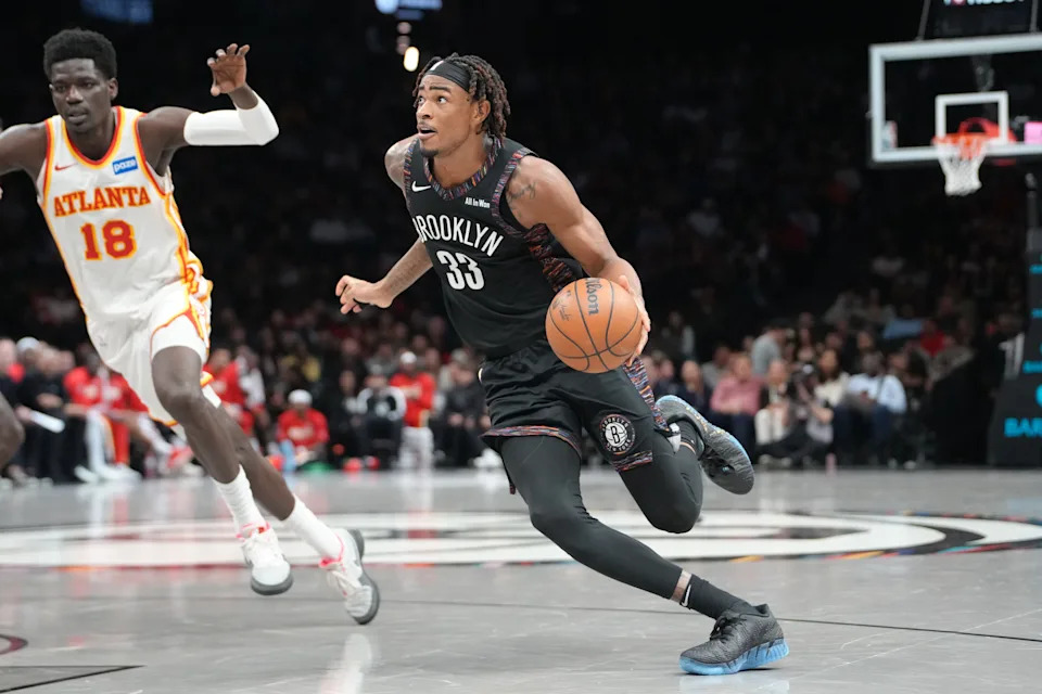 Apr 3, 2026; Brooklyn, New York, USA; Brooklyn Nets center Nic Claxton (33) dribbles the ball towards the basket against the Atlanta Hawks during the first half at Barclays Center. Mandatory Credit: Gregory Fisher-Imagn Images