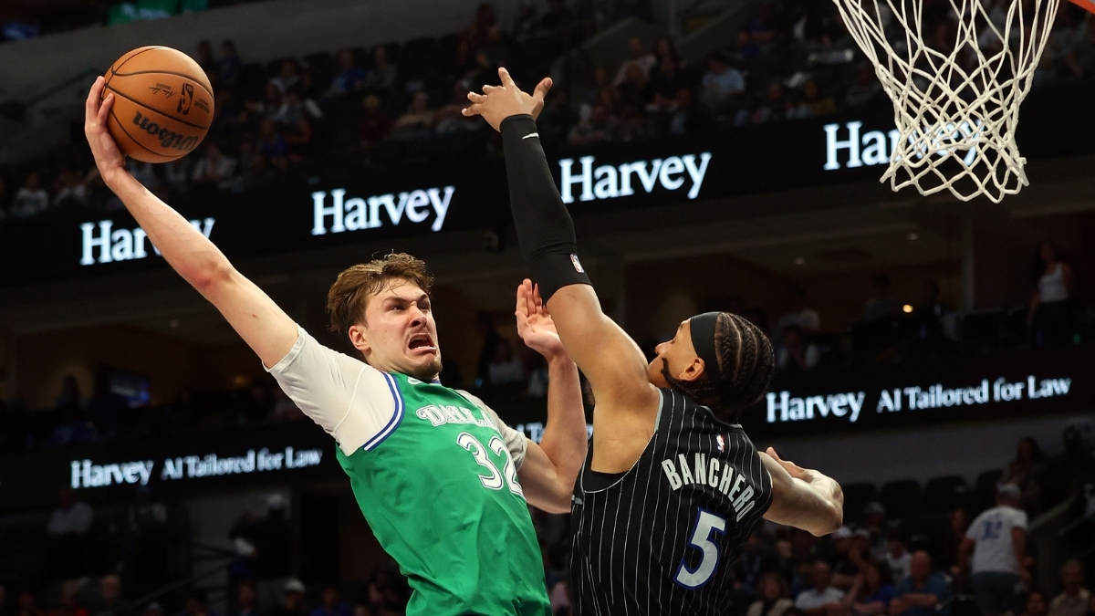 Cooper Flagg dunking on Paolo Banchero Dallas Mavericks vs Orlando Magic April 3 2026 American Airlines Center