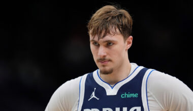 Cooper Flagg #32 of the Dallas Mavericks looks on during the fourth quarter of a game against the Milwaukee Bucks at Fiserv Forum.