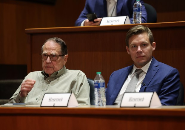 Jerry Reinsdorf, Chicago White Sox Chairman, left, and Chris Getz sit before speaking at a news conference to announce Getz's promotion to general manager at Guaranteed Rate Field on Thursday, Aug. 31, 2023, in Chicago. (John J. Kim/Chicago Tribune)