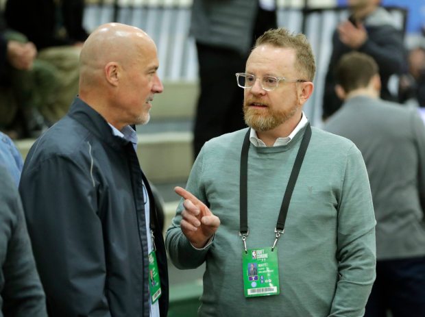 Chicago Bulls' John Paxton left, and Matt Lloyd, with the Orlando Magic, talk during the NBA draft basketball combine Friday, May 18, 2018, in Chicago. (AP Photo/Charles Rex Arbogast)
