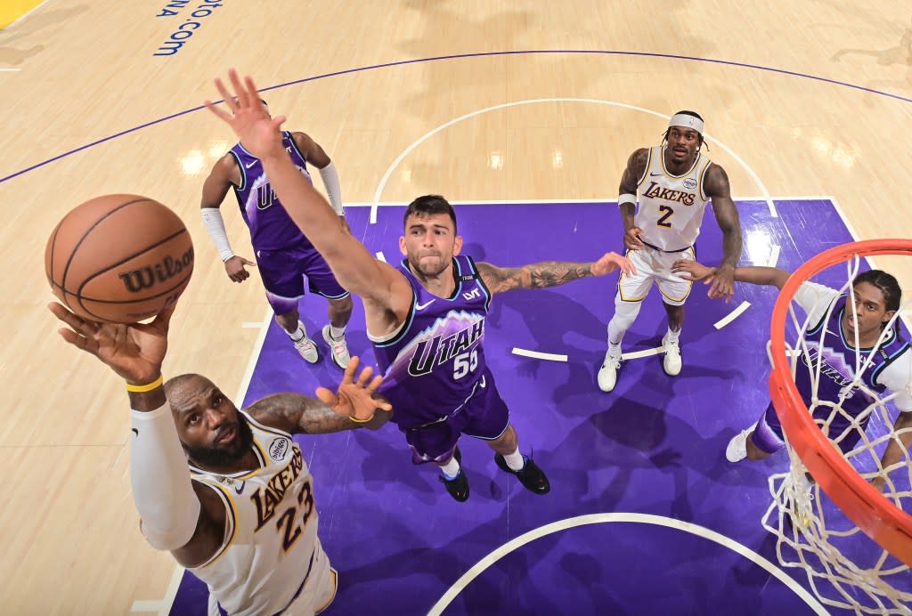 LeBron James goes up for a lay up against the Jazz. NBAE via Getty Images