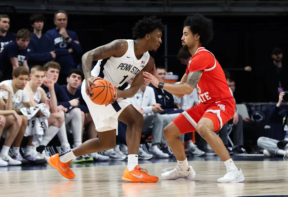 Mar 4, 2026; University Park, Pennsylvania, USA; Penn State Nittany Lions forward Mason Blackwood (1) holds the ball as Ohio State Buckeyes guard Taison Chatman (3) defends during the second half at Bryce Jordan Center. Mandatory Credit: Matthew O'Haren-Imagn Images