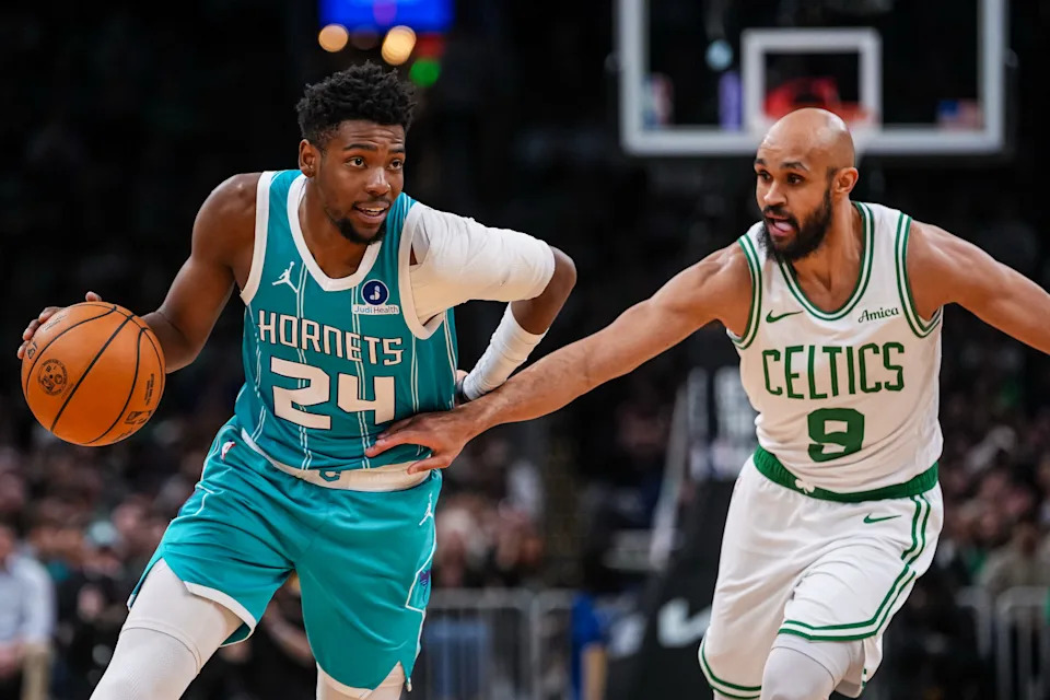 Apr 7, 2026; Boston, Massachusetts, USA; Charlotte Hornets forward Brandon Miller (24) drives the ball against Boston Celtics guard Derrick White (9) in the second half at TD Garden. Mandatory Credit: David Butler II-Imagn Images