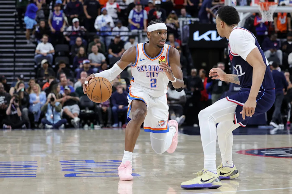 INGLEWOOD, CALIFORNIA - APRIL 08: Shai Gilgeous-Alexander #2 of the Oklahoma City Thunder drives against Jordan Miller #22 of the Los Angeles Clippers during the second half of an NBA game at Intuit Dome on April 08, 2026 in Inglewood, California. NOTE TO USER: User expressly acknowledges and agrees that, by downloading and or using this photograph, User is consenting to the terms and conditions of the Getty Images License Agreement. (Photo by Ryan Sirius Sun/Getty Images)