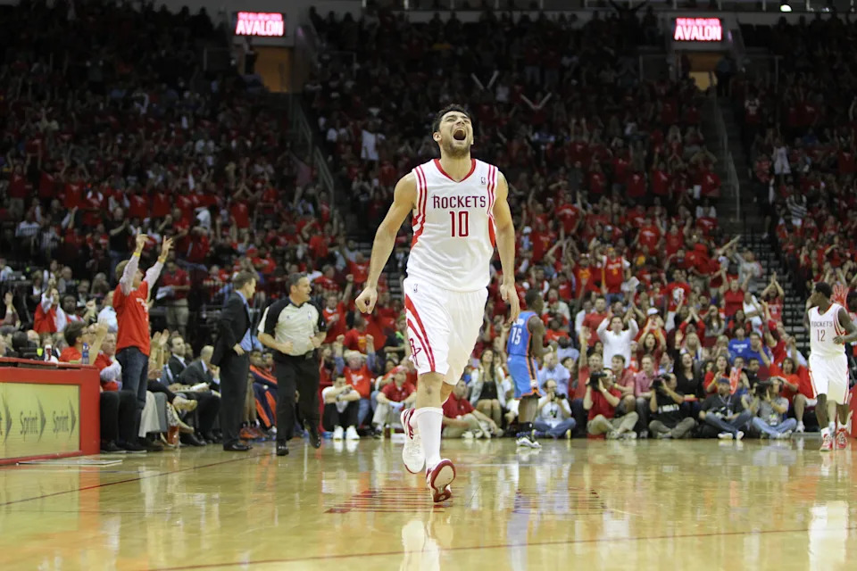 Apr 29, 2013; Houston, TX, USA; Houston Rockets shooting guard Carlos Delfino (10) shows emotion after a basket against the Oklahoma City Thunder in the fourth quarter in game four of the first round of the 2013 NBA playoffs at the Toyota Center. The Rockets defeated the Thunder 105-103. Mandatory Credit: Brett Davis-USA TODAY Sports