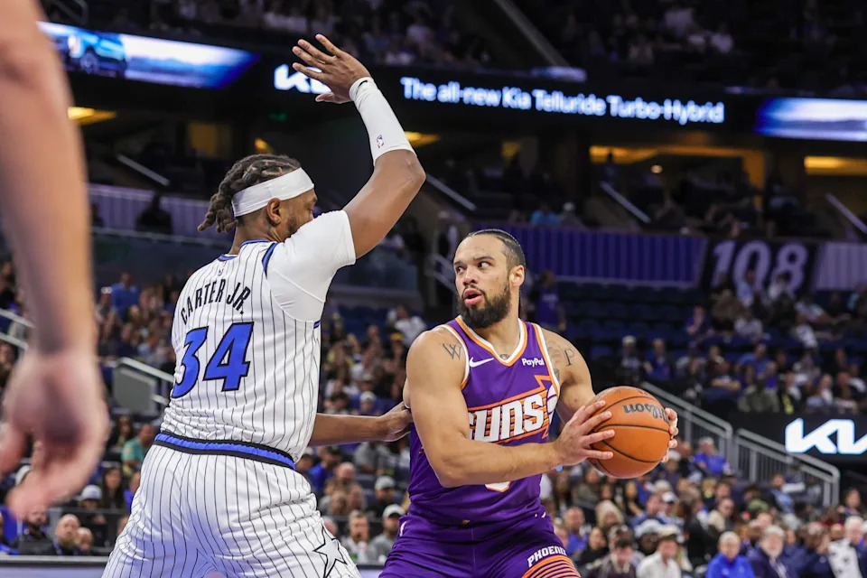Mar 31, 2026; Orlando, Florida, USA; Phoenix Suns forward Dillon Brooks (3) looks to shoot against Orlando Magic center Wendell Carter Jr. (34) during the first quarter at Kia Center. Mandatory Credit: Mike Watters-Imagn Images