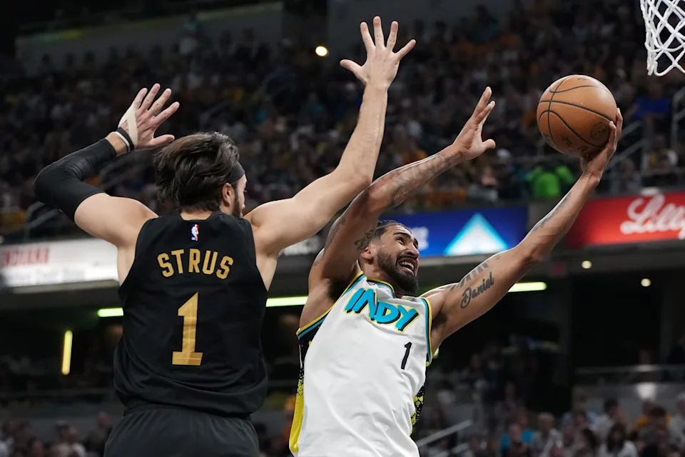 INDIANAPOLIS, INDIANA - MAY 11: Obi Toppin #1 of the Indiana Pacers attempts a layup while being guarded by Max Strus #1 of the Cleveland Cavaliers in the first quarter during Game Four of the Eastern Conference Semifinals at Gainbridge Fieldhouse on May 11, 2025 in Indianapolis, Indiana. NOTE TO USER: User expressly acknowledges and agrees that, by downloading and or using this photograph, User is consenting to the terms and conditions of the Getty Images License Agreement. (Photo by Dylan Buell/Getty Images)